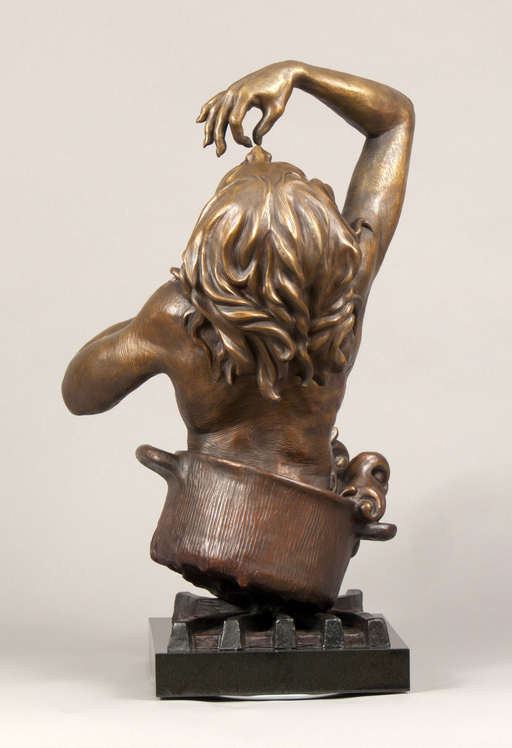 girl emerging from pot, bronze