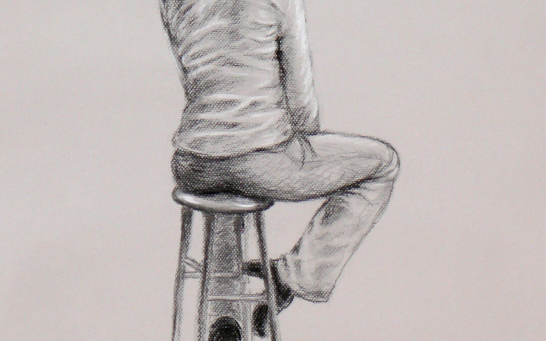 woman on stool from back