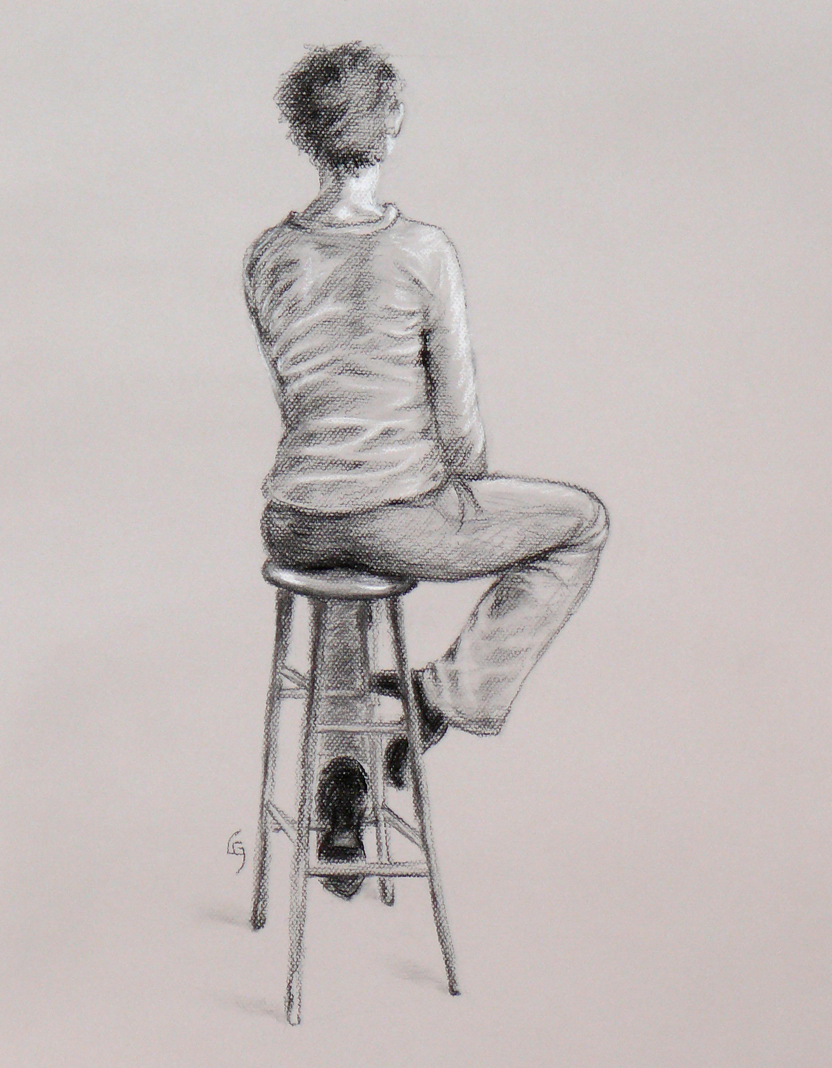 woman on stool from back